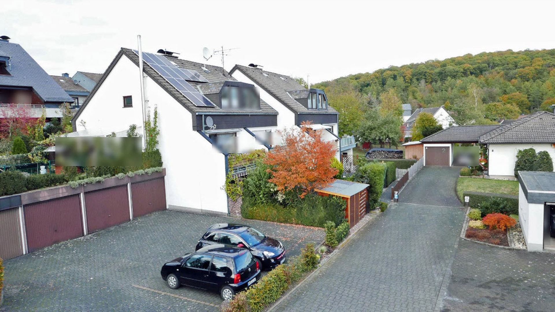 Schön und ruhig in Friesenhagen gelegen: Reihenhaus mit Appartement und Garage, Garage und Stellplatz am Haus (im Kaufpreis enthalten)