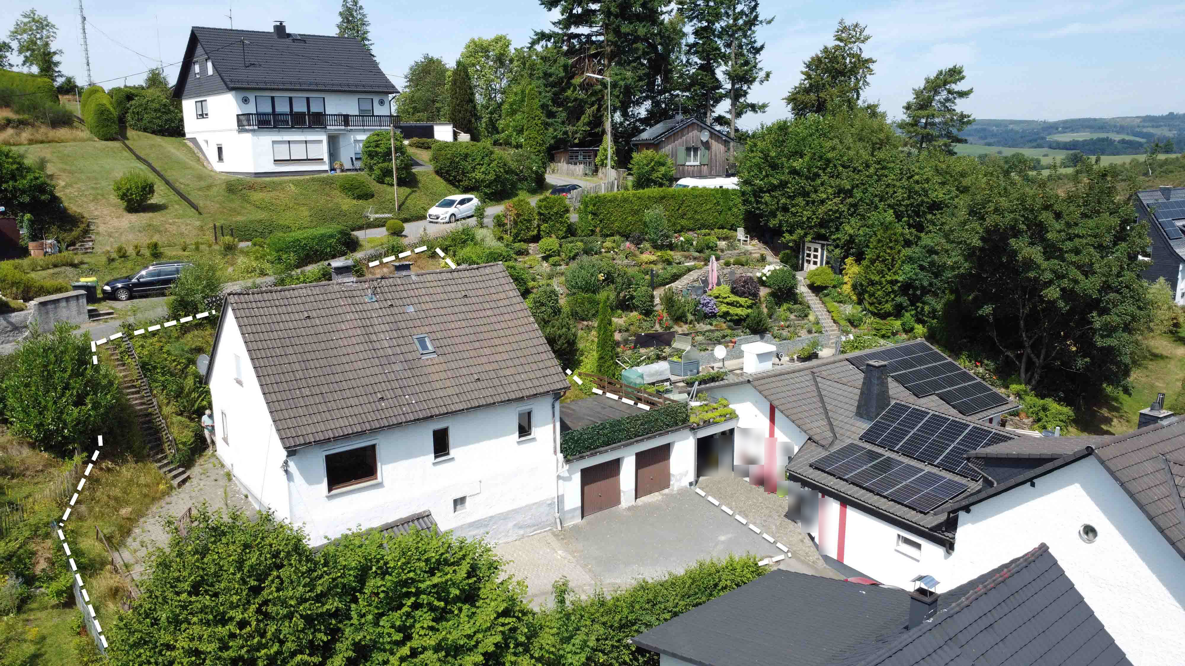 374 2-439 - Reichshof-Wildberg: preiswert wohnen / Wohnhaus mit Doppelgarage